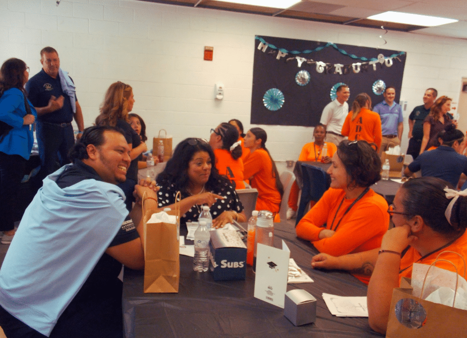 Graduates celebrating with family